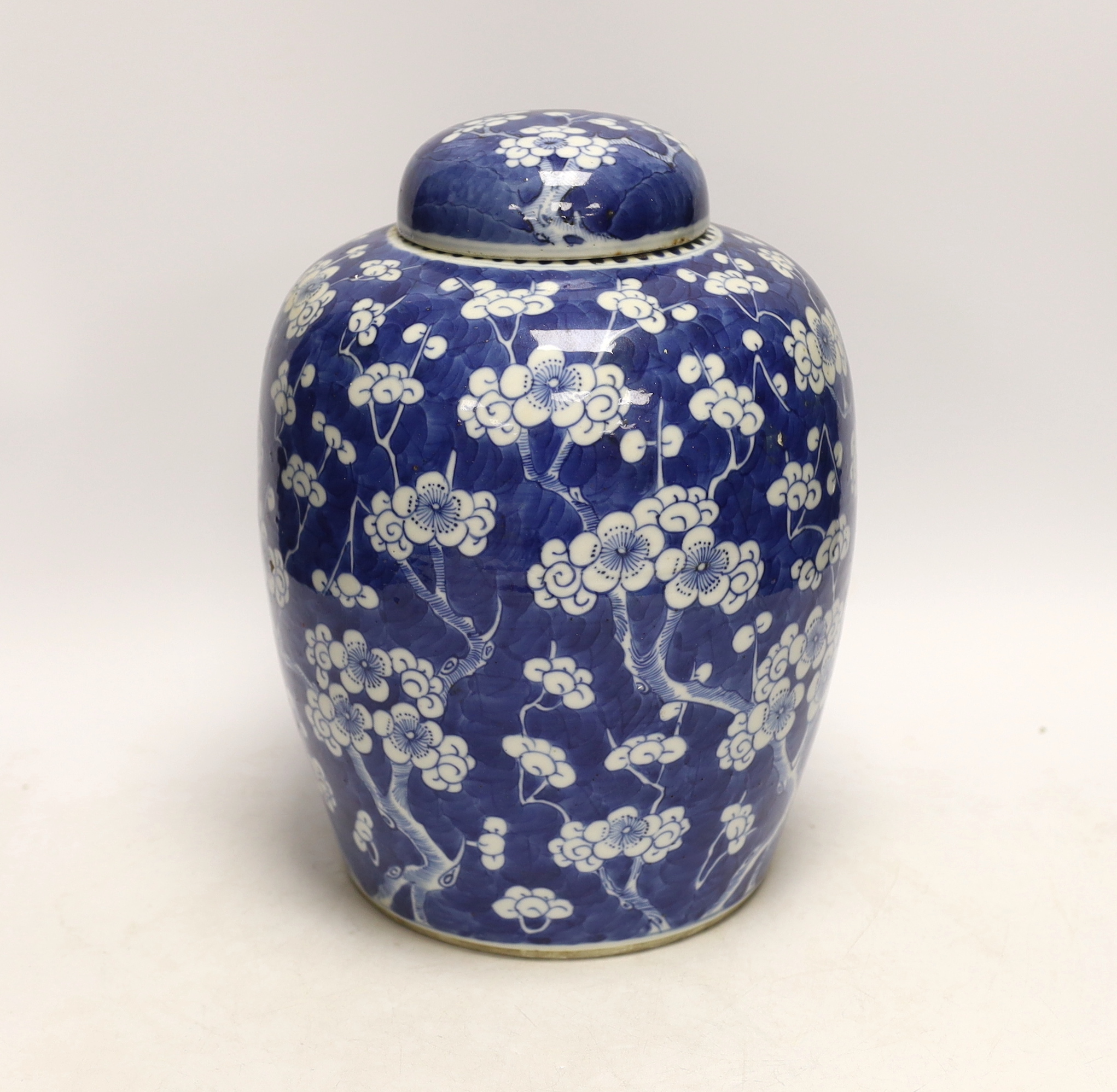 A Chinese blue and white prunus jar and cover, late 19th/early 20th century, 29cm high